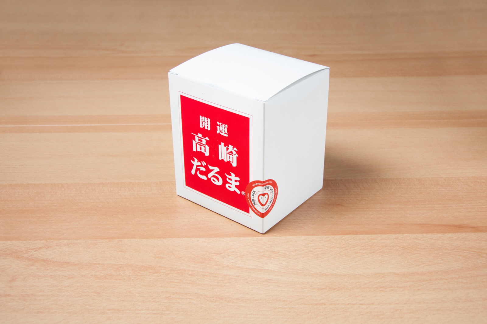 Daruma in verpakking